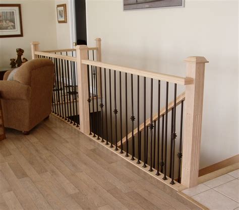 Indoor wood stair railing designs.  Our skilled craftsmen bring functiona...