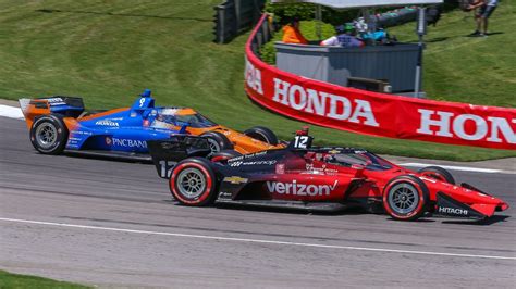 IndyCar champ Will Power shoves Scott Dixon after crash during practice for Road America