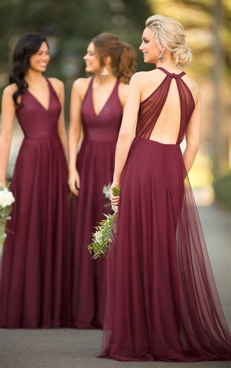 Inexpensive bridesmaid dresses. 2. Lulus Classic Elegance Satin Sleeveless Mock Neck Maxi Dress in Blue. Here's an elegant and inexpensive bridesmaid dress with a mock neckline, sleeveless bodice and a full maxi skirt. This gown looks so far from cheap, we can't believe it's under $100. 