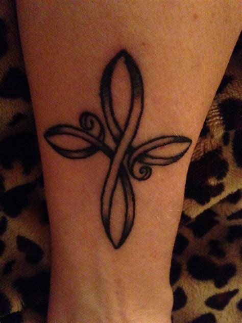 Infinity Cross on the inside of my left forearm... Infinity Cross