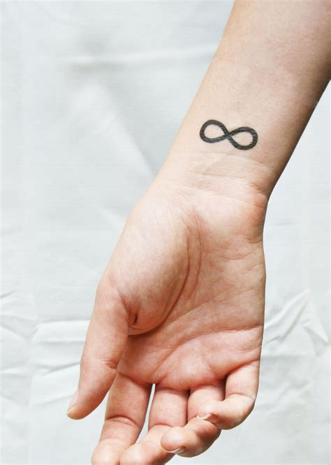 It is trendy with the girls to get a tiny infinity tattoo on the