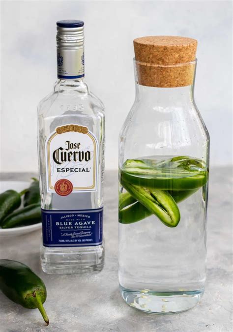 Infused tequila. Dec 16, 2019 · Add to clean glass jar, top with tequila and seal with airtight lid. Store in cool, dark place for at least 12 hours, but up to 48 hours. Strain into a measuring cup or glass bowl through a fine mesh sieve and discard jalapeños and limes. You may need to strain a few times or use a cheesecloth to remove all sediment. 