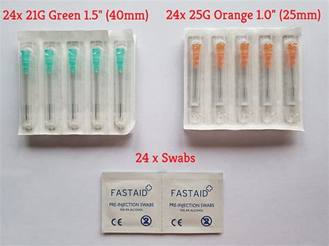 Injection needles and syringes.  Blue, Green, Orange Steroid Injection Needles.  ...