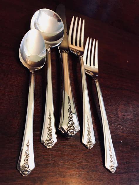 Inlaid silverware. Vintage 1937 Set of 4 Butter Spreaders by Holmes & Edwards "LOVELY LADY", Silver Plate Small Knives, Sterling Inlaid Flatware Wedding Gift (178) Sale Price $20.80 $ 20.80 $ 32.00 Original Price $32.00 (35% off) Add to Favorites Holmes and Edwards LOVELY LADY 1937 Silverplate ~ Teaspoon 6 1/8 " ~ Sold in sets of 4 ... 