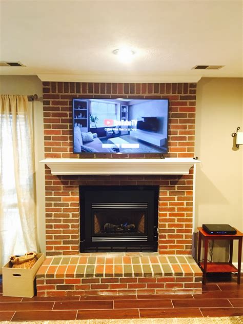 Install a tv above a fireplace. Measure, mark, and drill. Measure the spaces for your brackets and mark the correct spots on the wall. Drill your brackets in and double check that the placing is correct, and that everything is secured properly. We don’t want to install the brackets incorrectly and end up with a broken TV! Mount. 