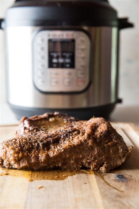 Instant pot brisket recipe. Return the meat to the IP, submerging it in liquid. Lock the lid and set to cook on high pressure for 1 hour and 15 minutes with a natural release (takes about another 30 minutes). Remove brisket and save the juices to make a sauce. Slice brisket against the grain or shred with two forks. Pour sauce over brisket. 