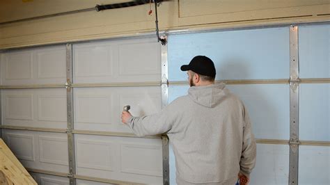Insulating a garage door. To reset a Legacy garage door opener, long-press the Prog button on the wireless keypad, and simultaneously long-press the 6 key and the triangular up-and-down buttons. Release all... 