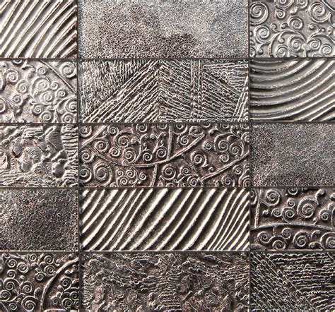 Intaglio sculpture definition. &rdquo; In intaglio printing, the lines or areas that hold the ...