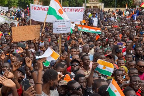 International pressure mounts on coup leaders in Niger while hundreds rally in support of junta