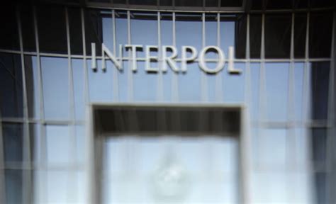 Interpol fights for survival on its 100th birthday