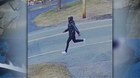 Investigators offer reward in search for suspect accused of robbing postal worker in Randolph