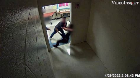 Investigators said video of student thrown into wall wasn't abuse, then changed their minds