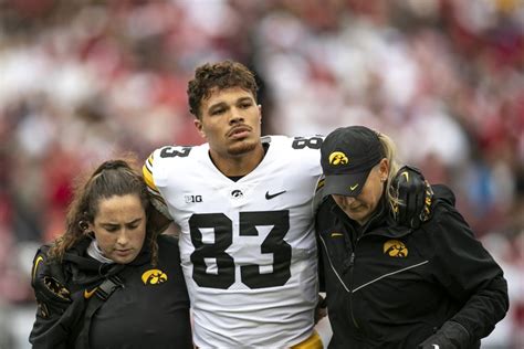 Iowa tight end Erick All, Wisconsin quarterback Tanner Mordecai leave with injuries in first half