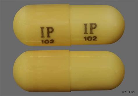 This yellow capsule-shape pill with imprint IG322 300 mg on it has 