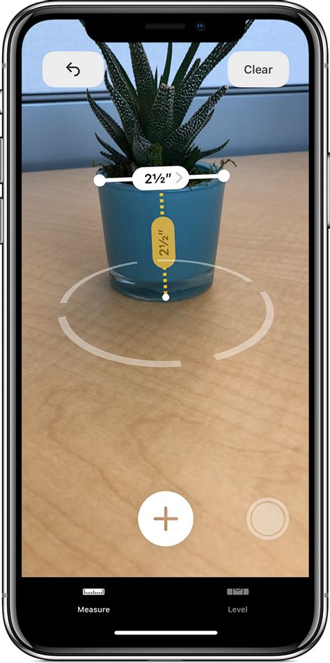 The Short Version. Open the Measure app. Find the object in your viewfinder. Tap the Plus button when the white dot is at the top and bottom of the object. Recommended videos. Powered by AnyClip .... 