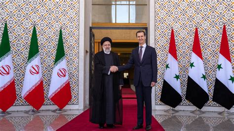 Iran’s president lands in Syria for rare meeting with Assad
