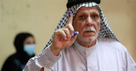 Iraqi voters head to the polls in test for democratic system