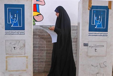 Iraqis participate in voting in general election in rare moment of calm