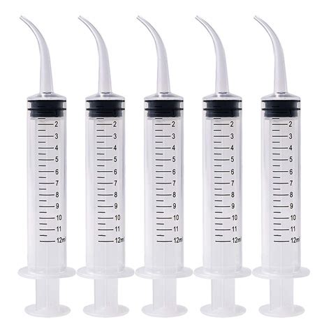 Irrigation syringe cvs. Kit contains 1 bottle of Debrox Earwax Removal Drops, 0.5 fl oz and 1 soft rubber bulb ear syringe. Active Ingredient: Carbamide Peroxide (6.5%) Non USP. Inactive Ingredients: Citric Acid, Flavor, Glycerin, Propylene Glycol, Sodium Lauroyl Sarcosinate, Sodium Stannate, Water. 