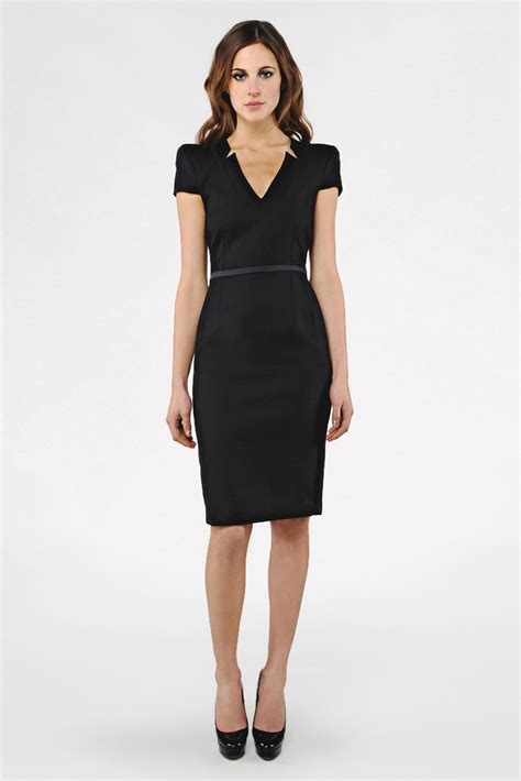 Is a black dress business casual. Throw It Back. Pull a Katie Holmes and wear your black dress the Y2K way, layering it over jeans or trousers. It's hard to go wrong with a black dress outfit, but keeping it feeling new can be a ... 