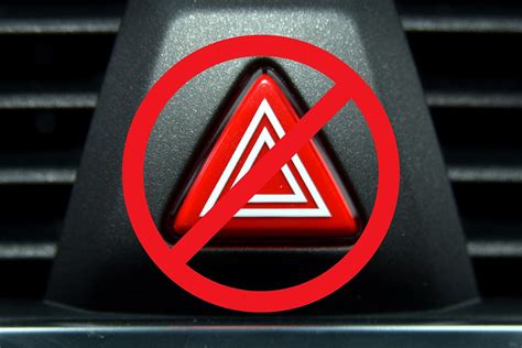 Is it illegal to drive with hazard lights on in Illinois?