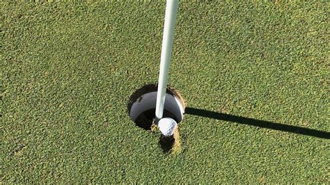 Is this golf ball embedded in the cup a hole-in-one?