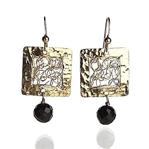 Isis Earrings - Etsy UK