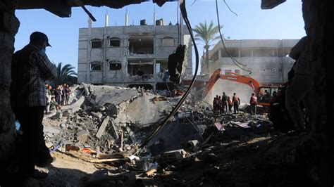Israel delivers deadly airstrikes in south Gaza and raids a hospital in the north