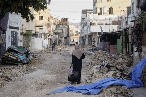 Israel ends West Bank raid calling it a blow to militants. Palestinians grapple with destruction