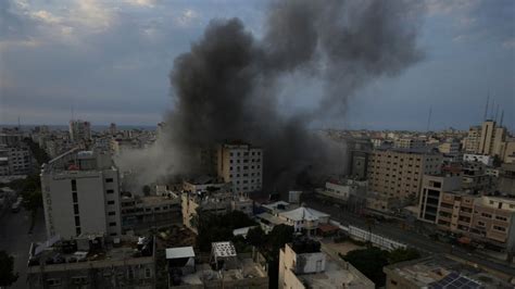 Israel intensifies its strikes and vows to besiege Gaza as it scours south for Hamas fighters