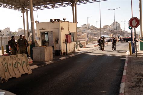 Israel reopens the main Gaza crossing for Palestinian laborers and tensions ease