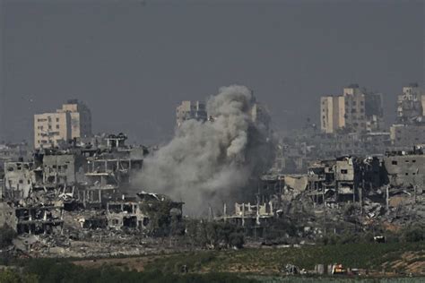 Israeli airstrikes level apartments in Gaza refugee camp, as ground troops battle Hamas militants