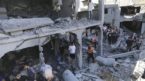 Israeli airstrikes surge in Gaza, killing dozens at a time in  destroyed homes, witnesses say