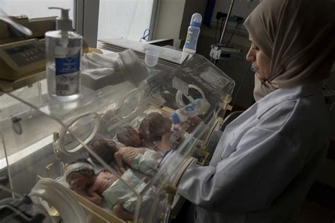 Israeli forces battle militants around another Gaza hospital as babies evacuated to Egypt
