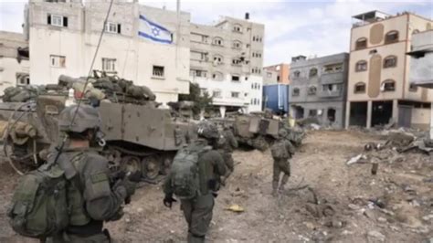 Israeli forces battle militants in Gaza’s main cities