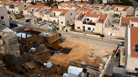 Israeli media say Israeli officials approved plans to build over 5,000 new homes in West Bank settlements