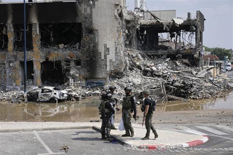 Israeli military official says ‘hundreds of terrorists’ have been killed and dozens captured amid Hamas incursion