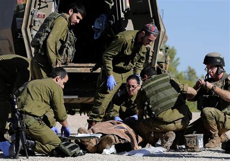Israeli military says at least 26 soldiers killed in unprecedented Hamas attack on country’s south