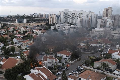 Israeli military says it is striking targets in the Gaza Strip as air raid sirens sound in Jerusalem