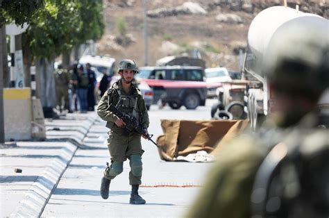 Israeli raid into West Bank camp kills 1 Palestinian, separate shooting attack wounds soldier
