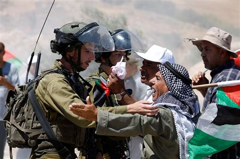Israeli settler shoots and kills Palestinian harvester as violence surges in the West Bank