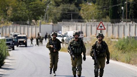Israeli soldiers kill a Palestinian militant in the West Bank, saying he threw explosives