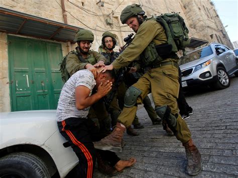 Israeli troops kill a Palestinian in a gunbattle outside a West Bank bakery