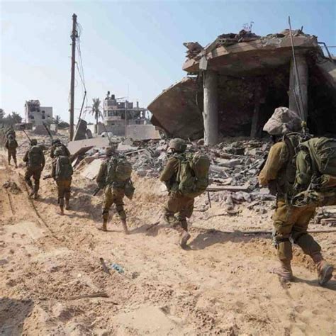 Israeli troops surround Gaza City and cut off the northern part of the besieged territory
