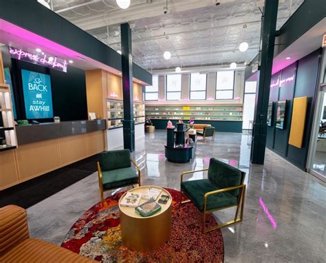 Walking into Ivy Hall — Waukegan’s first cannabis dispensary — after clearing security, a potential customer passes a couch, lounge chair and small coffee table before approaching…. 