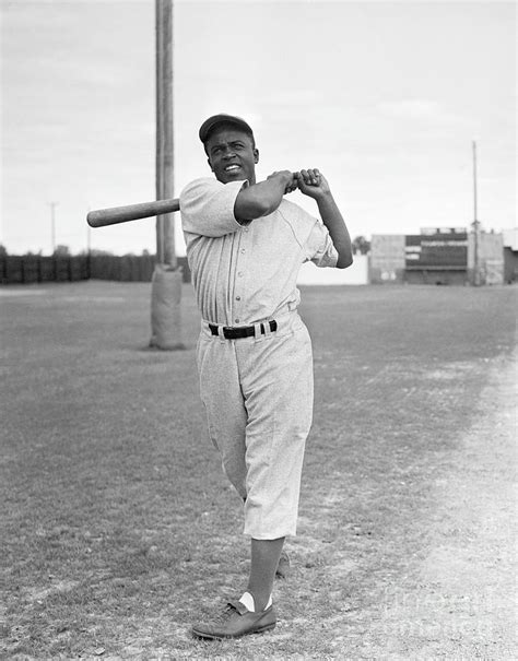 Jackie robinson batting stance. Jackie Robinson played second base, primarily, for the Brooklyn Dodgers (1947-1956) and finished his career with 1,518 hits, 137 home runs, 734 RBI and a .311 batting average. In 1997, Robinson’s number “42” was retired by all Major League Baseball teams. Jack Roosevelt Robinson was elected to the National Baseball Hall of Fame in 1962. 