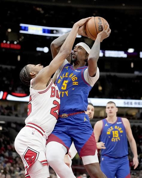 Jackson scores 25 points as Nuggets beat Bulls 114-106 after Jokic ejection