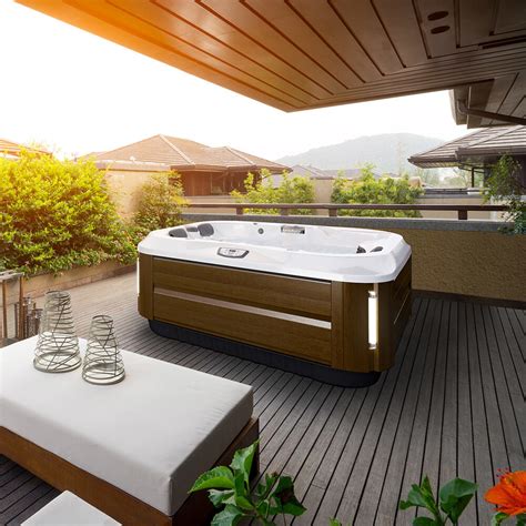 Jacuzzi hot tub. Quality and value meld in the J-235™ Hot Tub, built with superior materials and distinct Jacuzzi® design and features a full-size lounge seat for enjoyable hydromassage. Details The J-235™ model features various proprietary jets thoughtfully placed in ergonomic seats and two air controls to deliver the perfect massage. 
