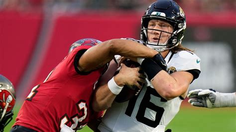 Jags QB Trevor Lawrence misses practice and insists he’ll ‘do anything’ to play against Carolina