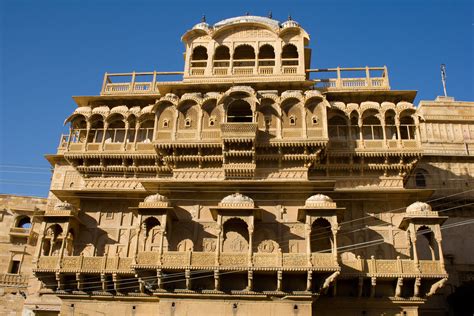 Located deep in the Thar desert, Jaisalmer is a relatively small town that was founded in 1156 by the 12th-century ruler Rawal Jaisal, and is often referred to as “the Golden City.”. Its main highlight, the Jaisalmer Fort, dominates the surrounding desertic flatlands and offers a great view from anywhere in the city.. 